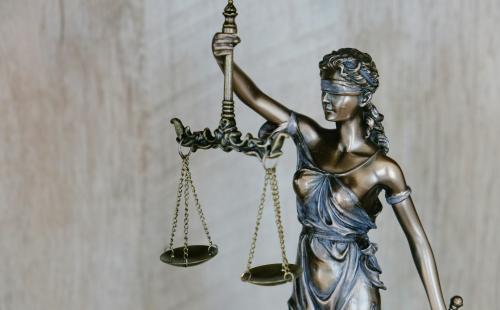 Figurine of Justice, blindfolded and holding scales and a sword