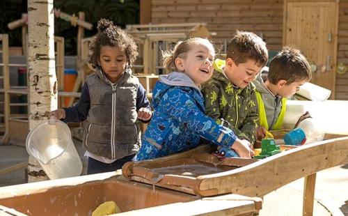 Young children playing outside