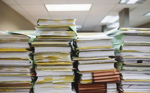 Piles of paperwork folders