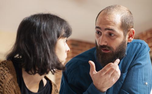 Woman and man having a discussion
