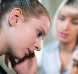 Child and adult having a difficult conversation