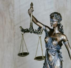 Figurine of Justice, blindfolded and holding scales and a sword